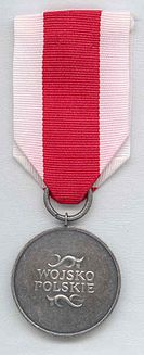 Medal Za zasługi dla obronności kraju-rew.jpg
