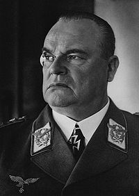Head-and-shoulders portrait of a uniformed Nazi German air force general in his 50s wearing an Iron Cross