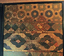 An array of tiles of differing shapes and colours