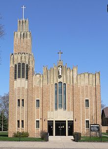 Art Deco church with statue of St. Stanislaus on upper facade