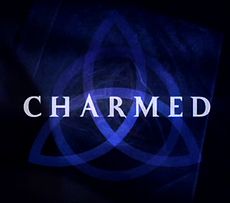 a dark blue triquetra over a darker blue background that fades to black near the edges with the word "charmed" in capital letters across the center using a light-blue, medium-sized font