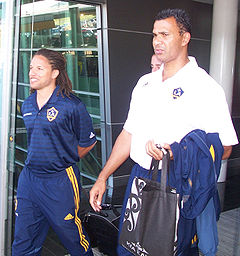 Cobi Jones (left) and Ruud Gullit leaving Wellington International Airport