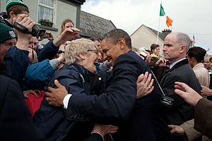 Barack Obama embraces a woman in the crowd in Moneygall