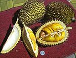 Whole and opened durians.
