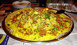 A plate of mansaf, a lamb dish cooked in yoghurt and served with rice.
