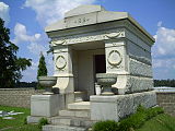 Mausoleum with "1912" and "ROSENBAUM" inscribed on the top and two chalices flanking the entrance