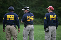 DCIS special agents participate in firearms training at FLETC.
