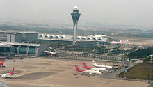 Guangzhou Baiyun International Airport control tower seeing from a takeoff