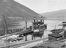 Historic photo of the ferry preparing to cross Lake Tinnsjø.