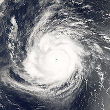 A view of Hurricane Ioke from Space on August 24, 2006. Hurricane Ioke at the time of this image had a well-defined round shape, clear spiral-arm structure, and a distinct but cloud-filled eye.