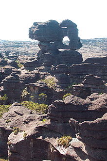 A cascading view of several rock formations.