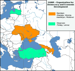 GUAM member states (orange) and observers (green).
