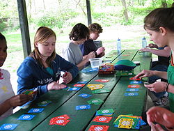 Homeschoolers playing Dutch Blitz at picnic gathering.jpg