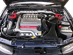 A 6A13TT 2.5 L V6 twin turbo in the engine bay of a Legnum VR-4 wagon.