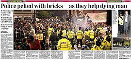 Image of a newspaper article. The headline reads, "Police pelted with bricks as they help dying man", and underneath "Heart attack victim found in alleyway. Riot officers clear out City Climate Camp. More arrests today at Stock Exchange."