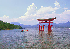 The torii of Itsukushima Shrine, the site's most recognizable landmark, appears to float in the water.