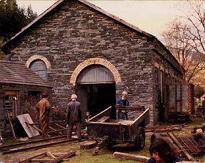 Maespoeth Junction locomotive shed in the early 1980s, members of the Corris Railway Society at work restoring the line